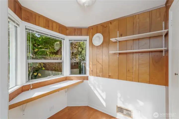 Mudroom/Office off the back door and leads to doorway down to finished Basement living