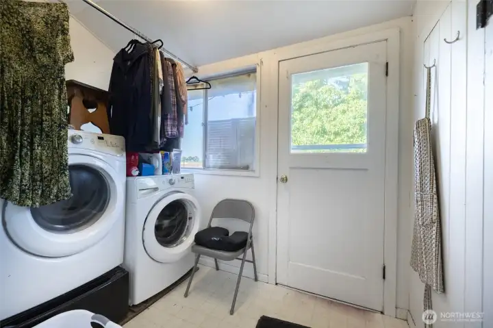 Mudroom/laundry leads to back entrance
