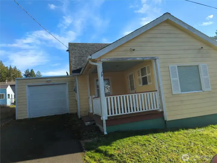 Covered porch on the sheltered side of the home.
