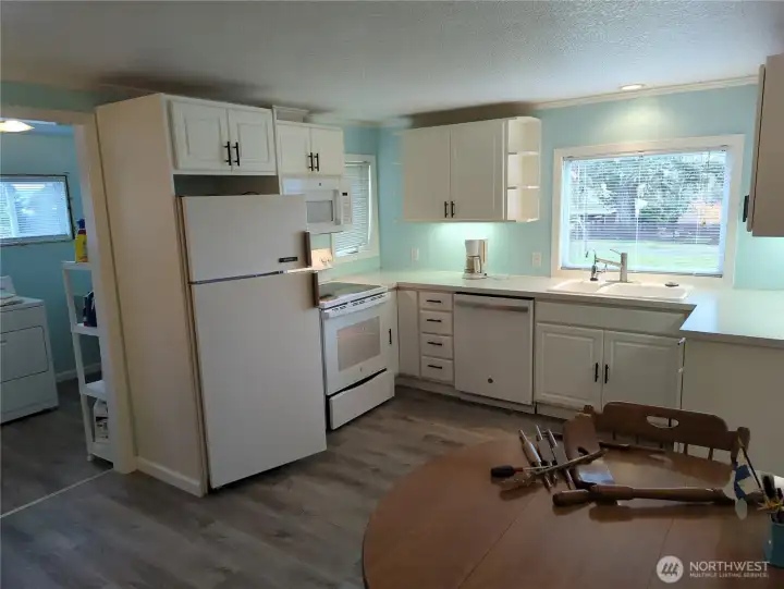 Another view of the cheery kitchen.