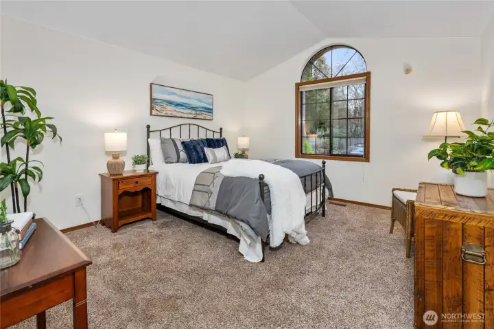Main floor en suite bedroom has plenty of space.
