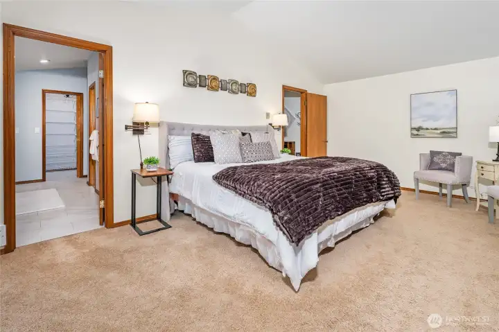 View of the primary bedroom looking into the primary bathroom.