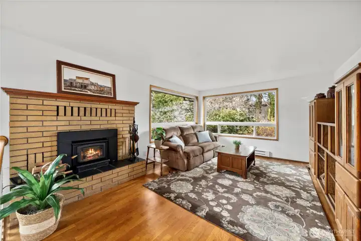 Upstairs living room with large picture windows.