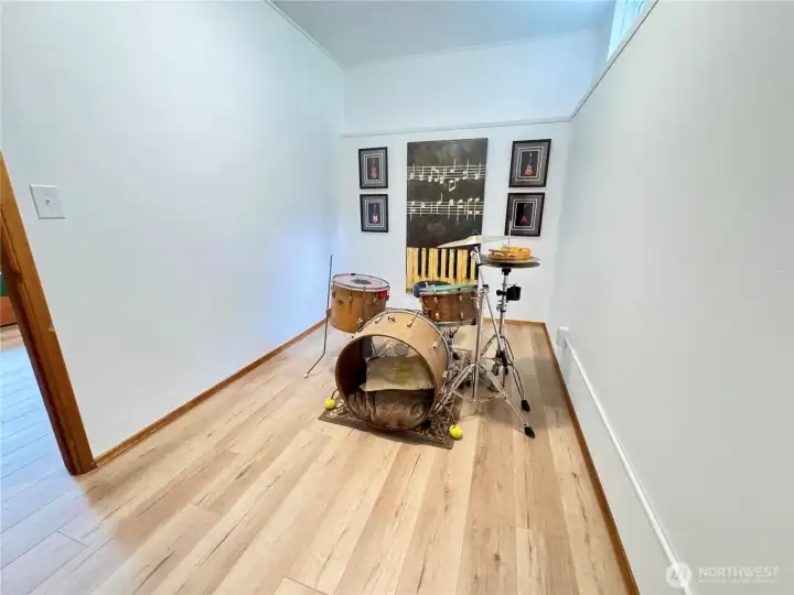 Currently set up as a music room. Could be a walk-in closet or an office.