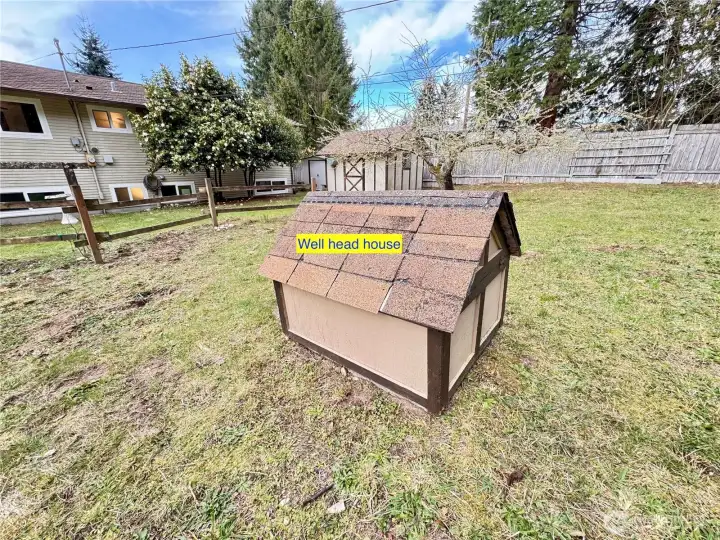Well head house in the backyard.