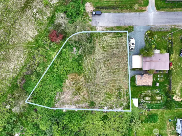 Double lot located in Holmes Harbor Estates community!