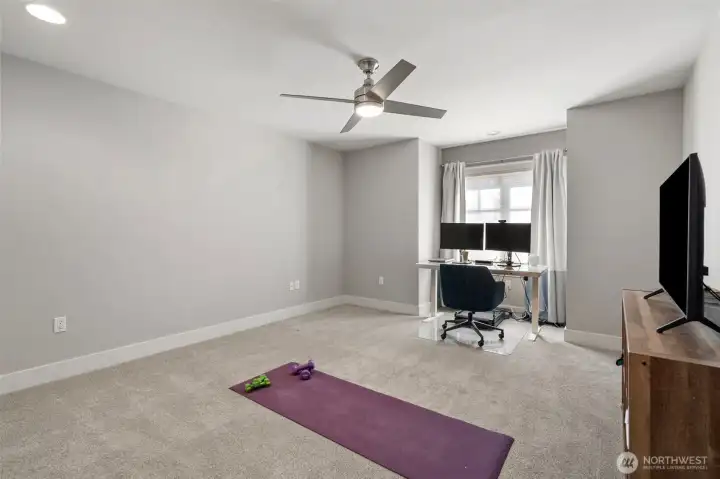 4th bedroom on upper level - all bedrooms enjoy oversized closets and plenty of natural light.