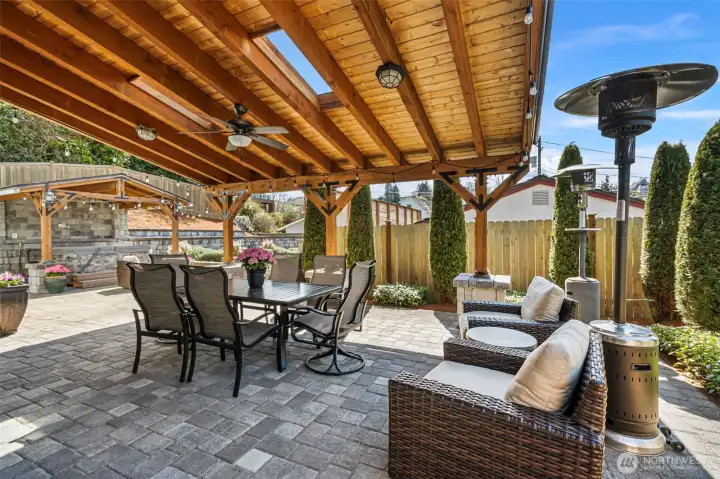 The dream continues in the backyard, where every element of outdoor living has been thoughtfully designed for enjoyment.