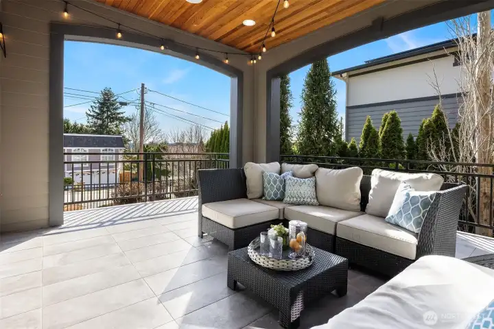 Spill out from the dining room for al fresco enjoyment on the covered balcony.