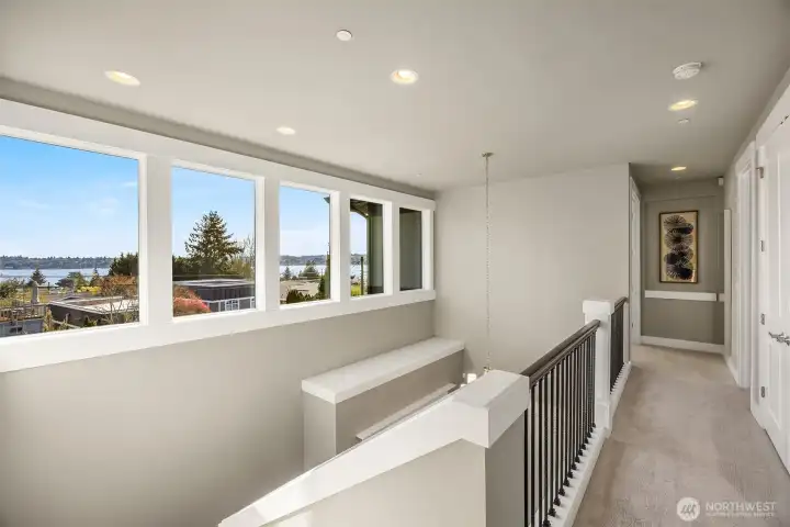 Sparkling lake views await you on the upper level.