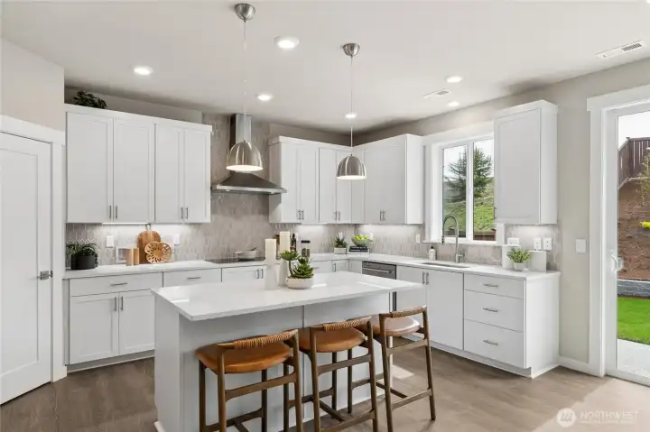 Induction cooking and KitchenAid appliances.