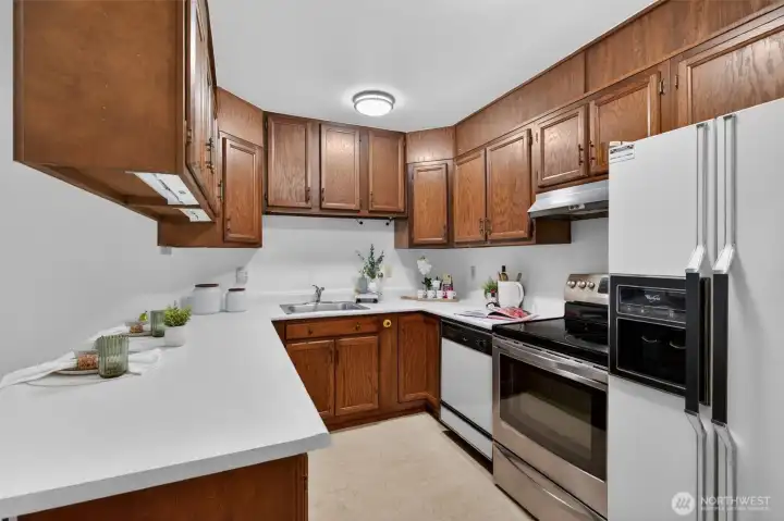 No nonsense kitchen with plenty of storage. Eating space and Laundry also located in the kitchen. No nonsense kitchen with plenty of storage. Eating space and Laundry also located in the kitchen.