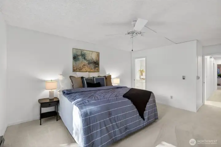 The primary is located at the end of the hallway and offers privacy with the window looking out to back of the home. The primary is located at the end of the hallway and offers privacy with the window looking out to back of the home.