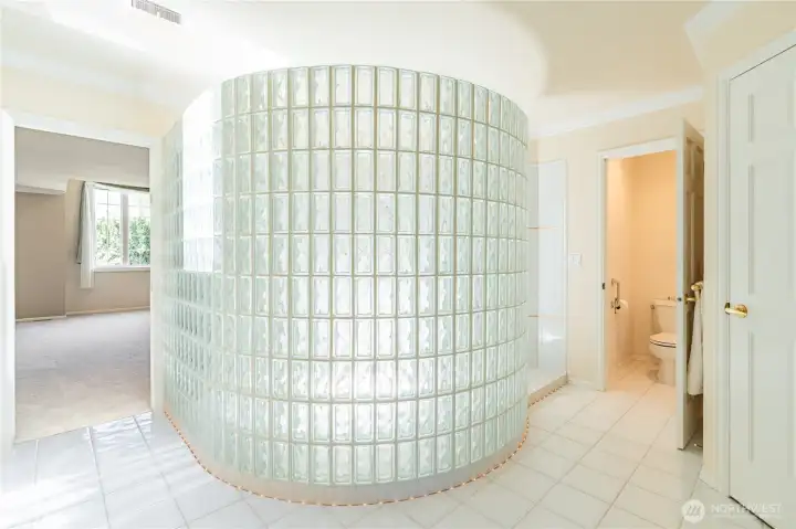 Huge glass block shower is another feature of this amazing ensuite bathroom. Separate loo with a door for privacy. Huge glass block shower is another feature of this amazing ensuite bathroom. Separate loo with a door for privacy.