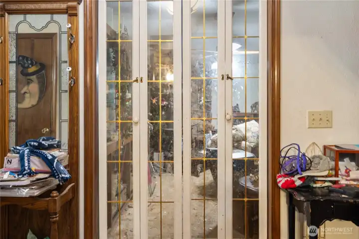 Partition doors between entry and great room.