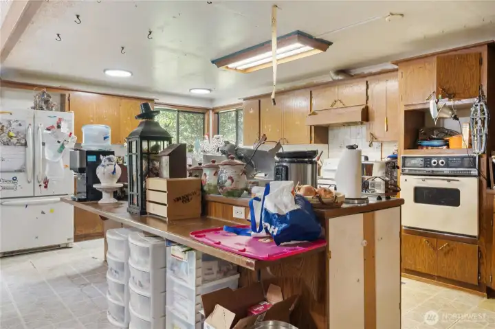 Kitchen is a farm house kitchen - marble counter area lots of storage and counter space. Grow your food and process it in your own kitchen.