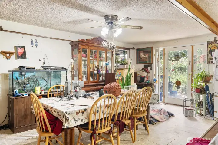 Dining room with slider to the backyard.  Bonus room just behind.