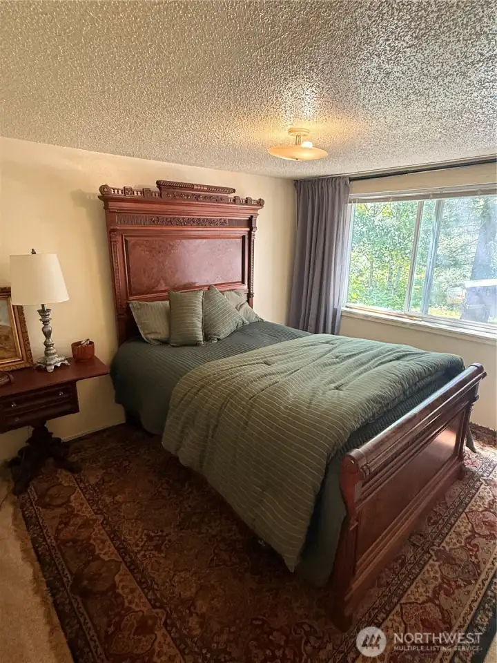 Primary bedroom1. Comfortable bedroom with plenty of natural light. Primary bedroom1. Comfortable bedroom with plenty of natural light.
