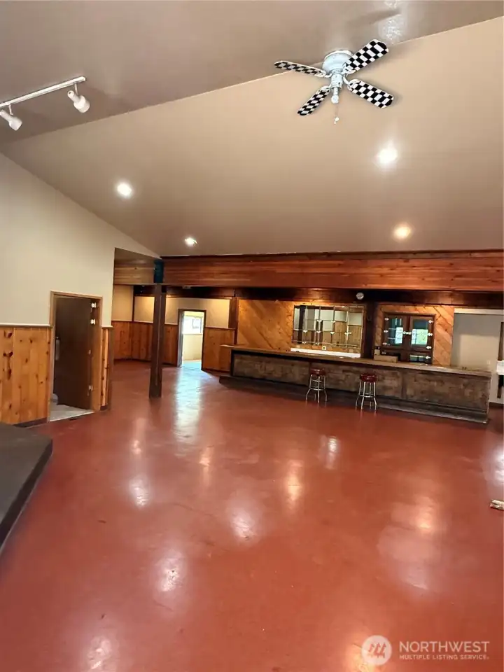 View from rear entrance into the spacious gathering area. View from rear entrance into the spacious gathering area.