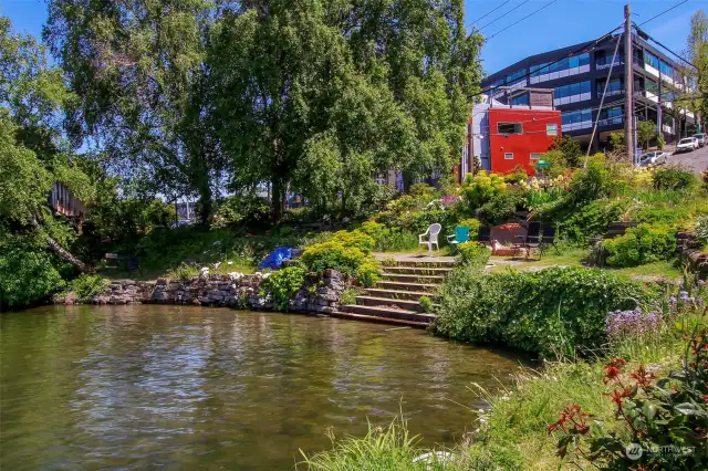 Grab a picnic lunch and enjoy it at this perfect street end park next to the floating home.