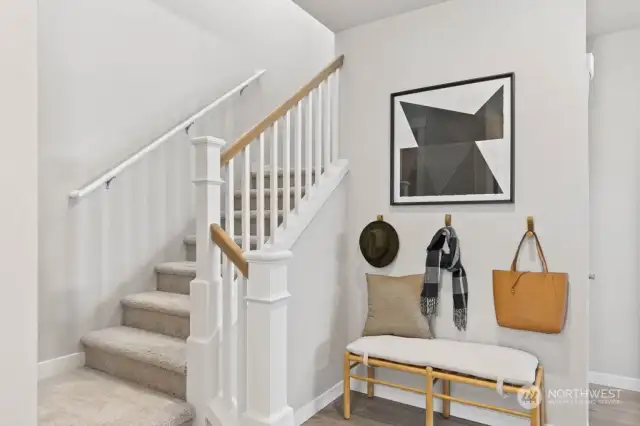 Nice entry area w/stairs to 2nd level. “Photos are for representational purposes only. Colors and options may vary” - Love the open rail