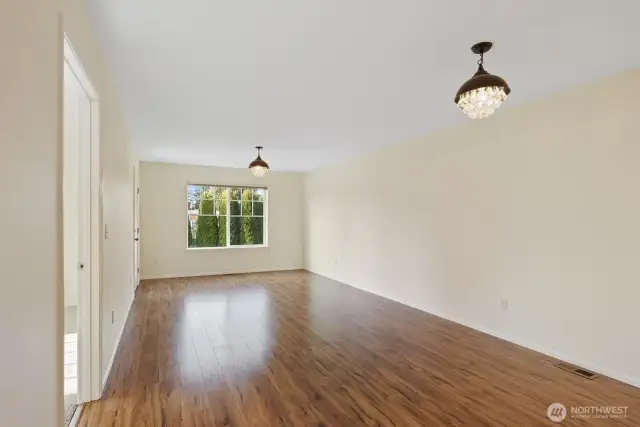 Primary Bedroom to the left of the dining space.