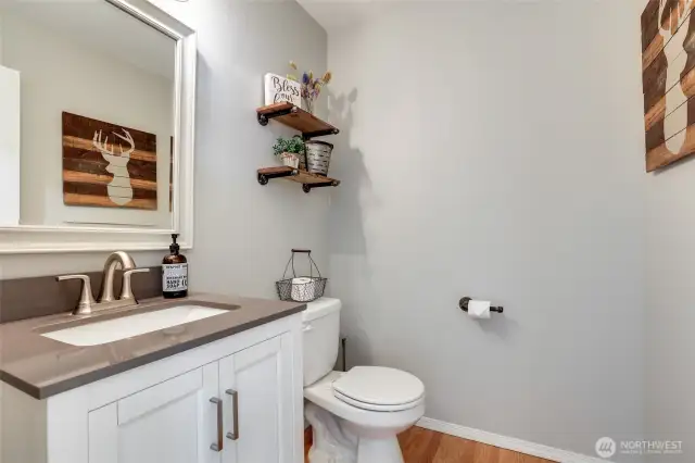 Powder room adjacent to family room.