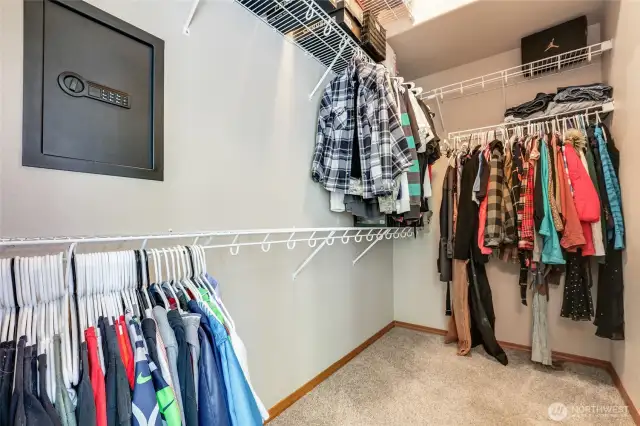 Walk-in closet with security safe.