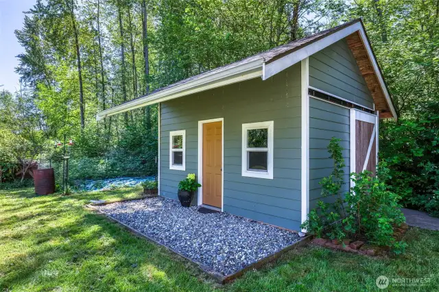Outbuilding with room for toys, lawn equipment, tools, etc.