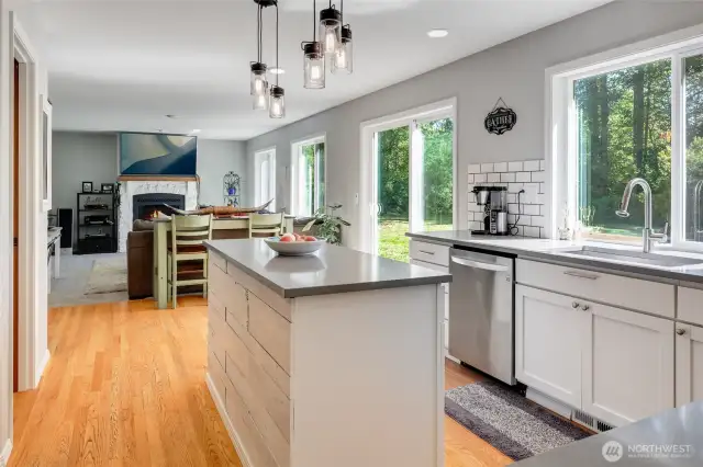 Kitchen leads to family room area.