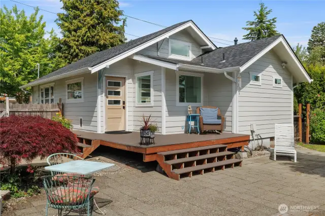 Low maintenance deck and paved patio.