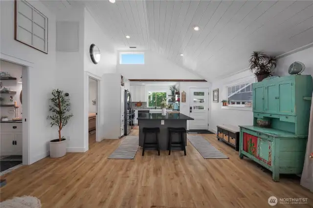 Spacious open floor plan with soaring shiplap ceilings.