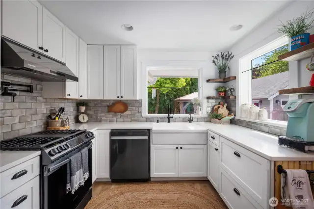 Beautiful white cabinetry & new appliances, kettle filler and instant hot water dispenser.