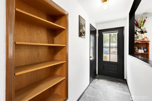 Front entry way with built in shelving