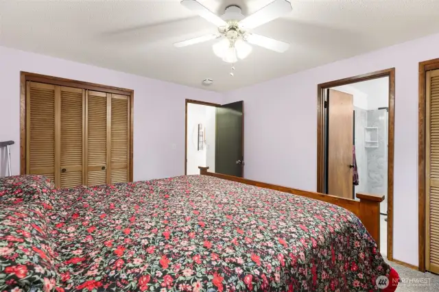 There are two closets and quarter bathroom in primary bedroom