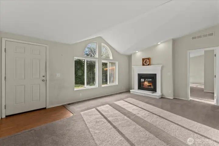 Lots of sunshine and views of the trees from your living room! Primary bedroom is private from the other bedrooms.