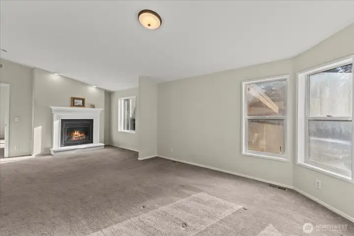 The primary bedroom also enjoys a fireplace!