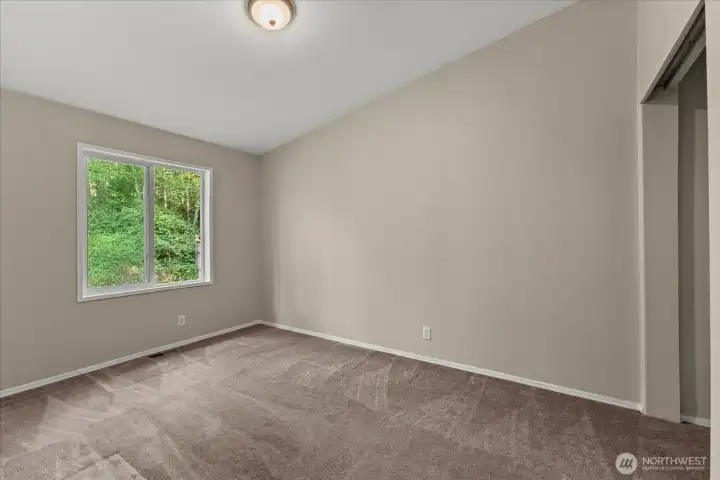 Bonus room looks at the private back yard.