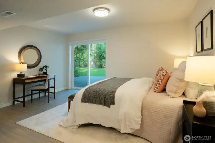 Lower level secondary suite or flexible living space. Includes sliding door to the backyard or us as a private entrance.