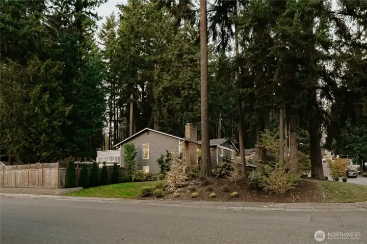 Fully professionally landscaped corner lot.