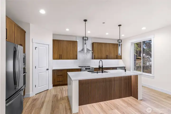 Kitchen With Eating Space Open to Living Room