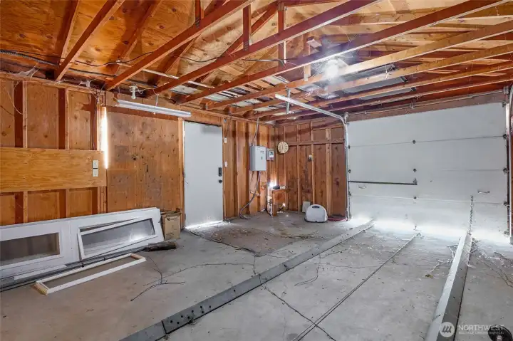 This boathouse, complete with electricity, features handy launching cradle tracks. These long, parallel rails run from the water into the boathouse, forming the slipway that the trolley—and the boat it carries—rides on when moving in and out of the water.
