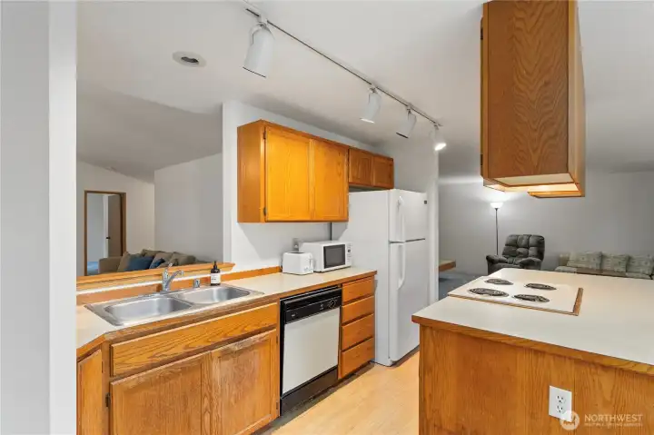 You can see through to the living room from the sink.