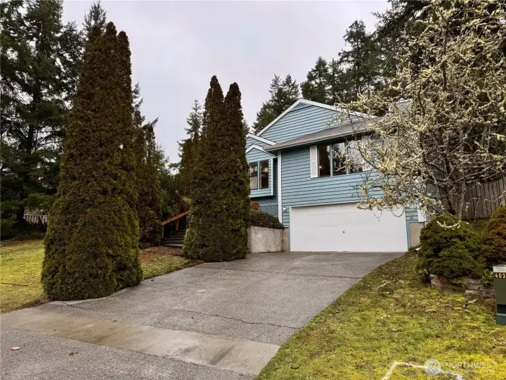 2 car garage with room to park at least 4 more in the driveway.