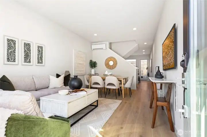 Photos of model home 9752 with similar finishes & floor plan. Step inside and feel the difference—an open-concept main floor designed for connection, comfort, and your favorite home rituals.