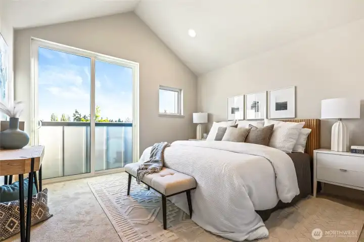 Photos of model home 9752 with similar finishes & floor plan. Your top-floor sanctuary awaits—vaulted ceilings, abundant light, and a private balcony that invites sunsets.