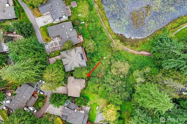Home backs to green space just steps from the Lake Louise walking trail, offering easy access to nature and one of Sudden Valley’s most scenic neighborhood loops.