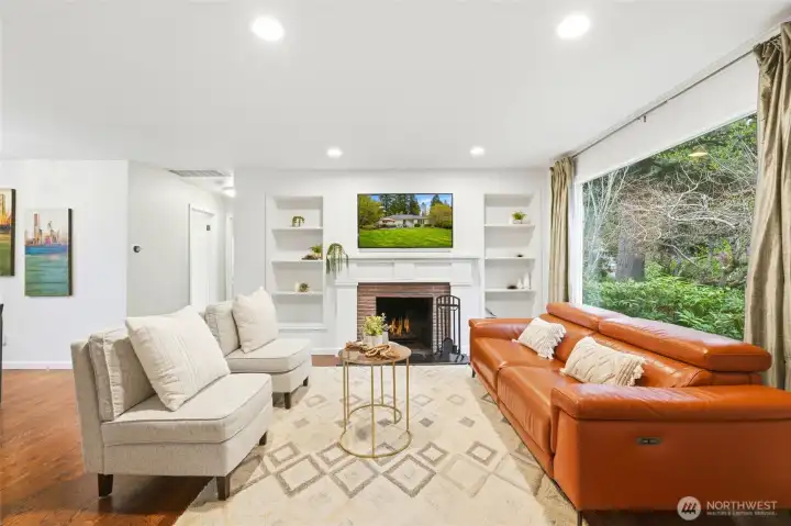 The living room is flooded with natural light, creating an airy, welcoming space that lives larger than expected.