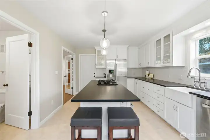 A spacious, beautifully designed kitchen with eating area—where everyday living happens.