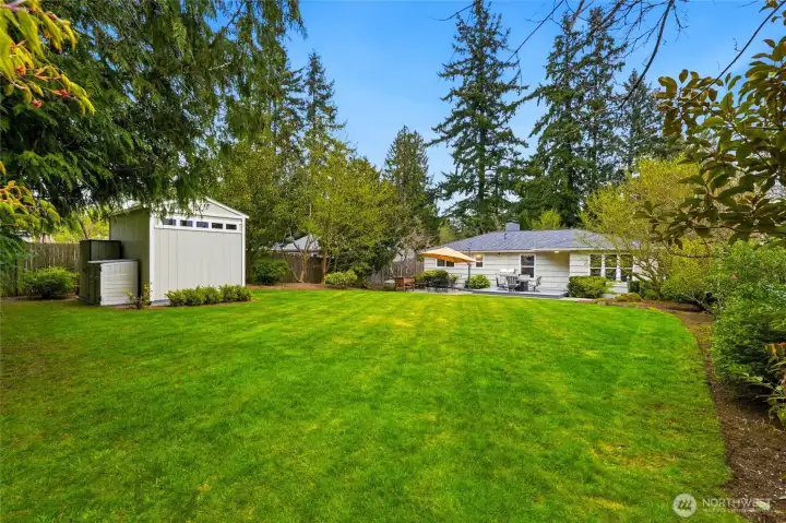 The grounds feel like a private retreat, with lush, established gardens and mature landscaping throughout.